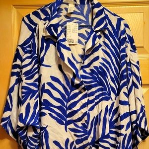 Womans H & M white with navy blue leaves button down v neck blouse